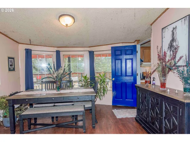 a kitchen with a wooden floor