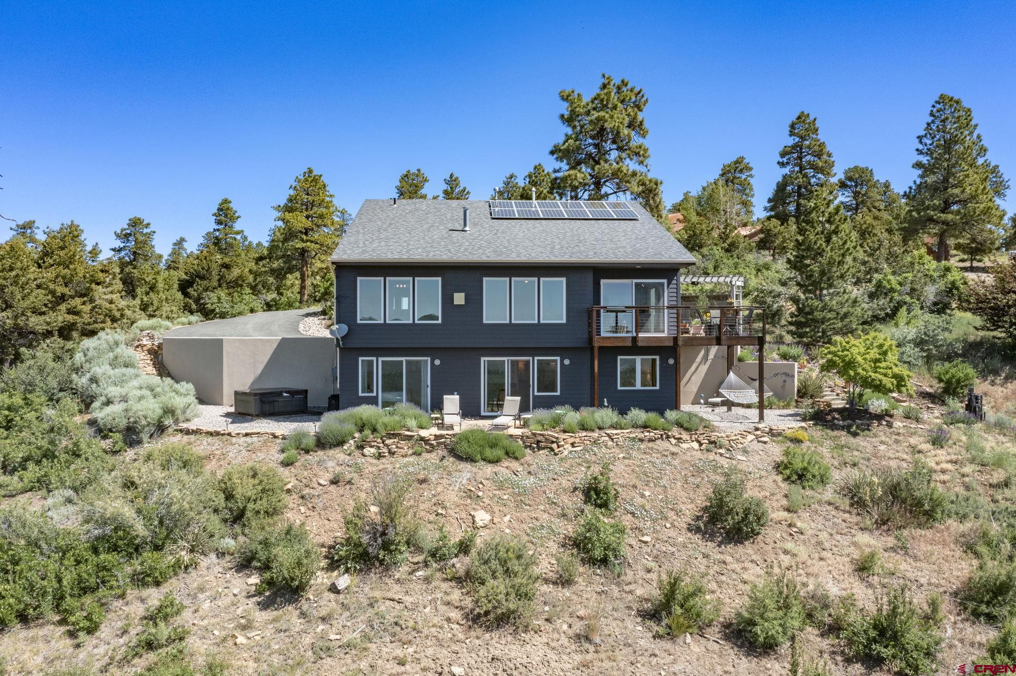 1584 Ridge Road Durango, CO 81303 - Photo 33 of 35 a front view of a house with a yard