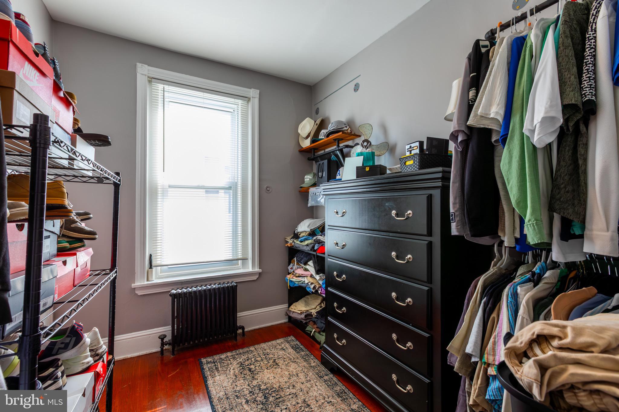 4360 Pechin Street Philadelphia, PA 19128 - Photo 25 of 40 a view of walk in closet with clothes and shoes