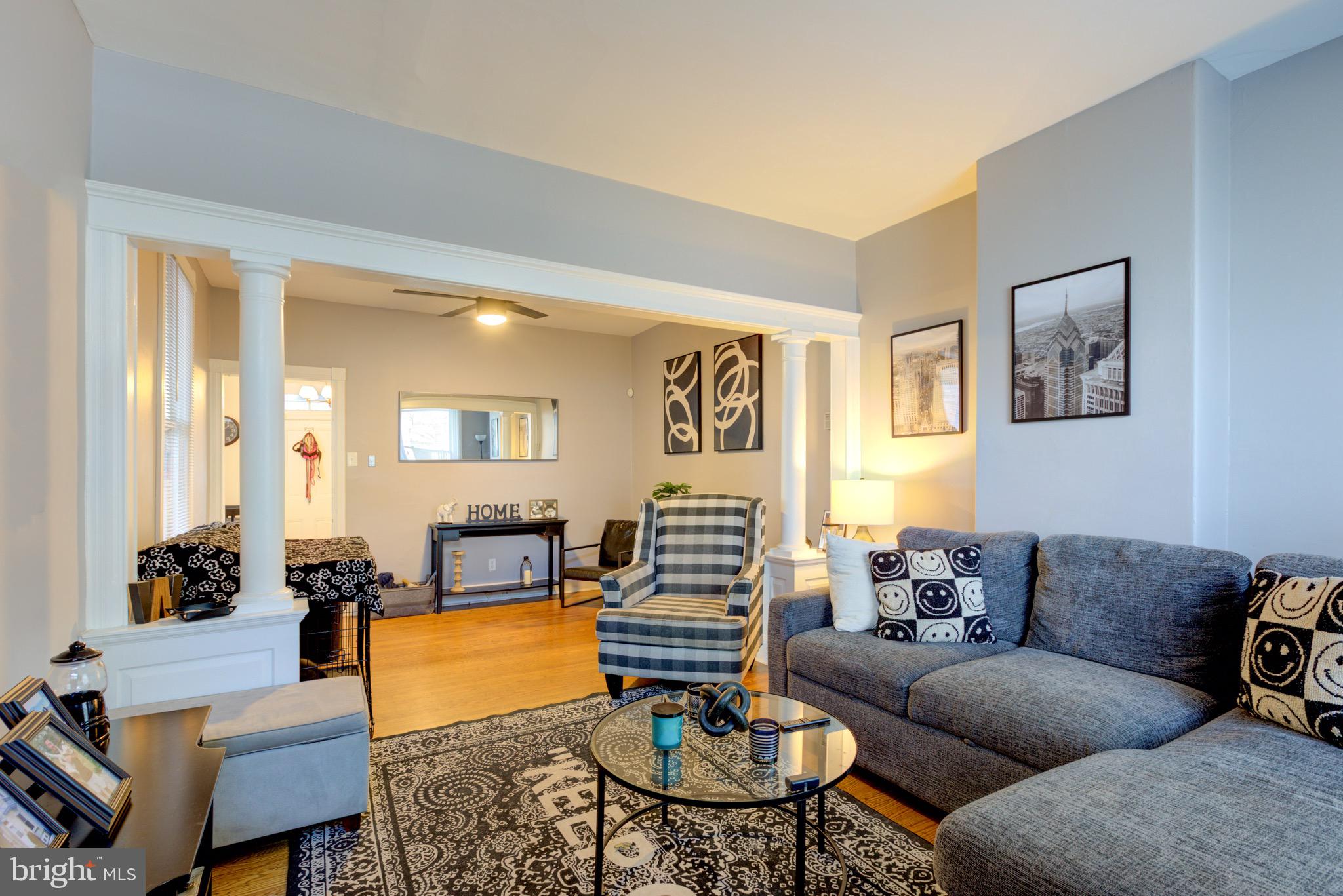 4360 Pechin Street Philadelphia, PA 19128 - Photo 8 of 40 a living room with furniture and a fireplace