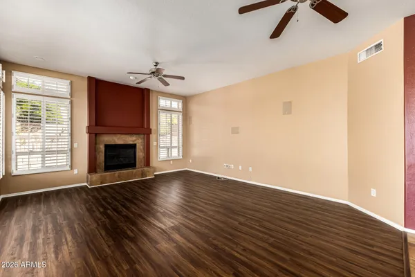 a kitchen with a refrigerator and a sink