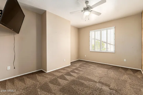 a view of a house with pool table and chairs