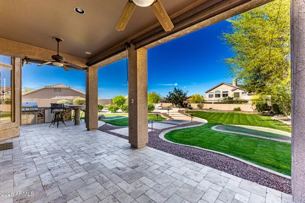 an aerial view of residential houses and outdoor space