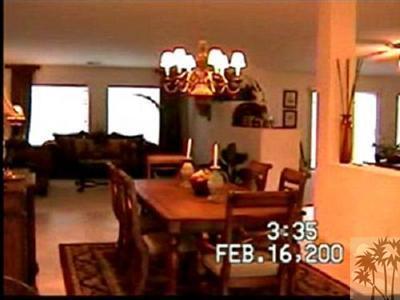 47750 Mirage Way Indio, CA 92201 - Photo 12 of 26 a view of a dining room with furniture and chandelier