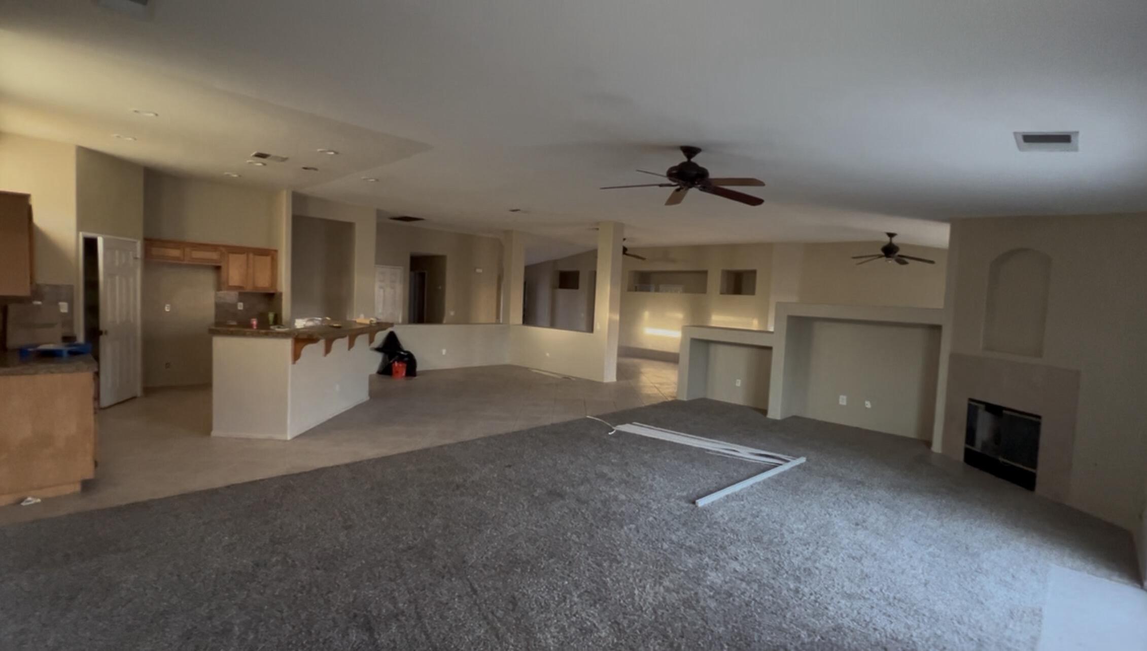 47750 Mirage Way Indio, CA 92201 - Photo 7 of 26 a view of a kitchen with a sink and a refrigerator