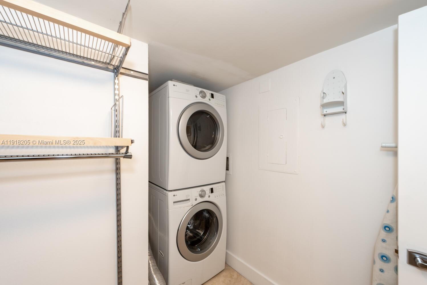 141 Crandon Boulevard, Unit 235 Key Biscayne, FL 33149 - Photo 25 of 25 a utility room with dryer and washer