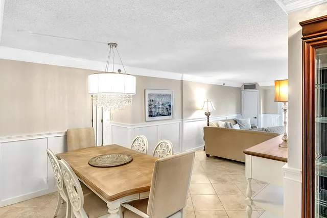 a kitchen with cabinets appliances and a counter space