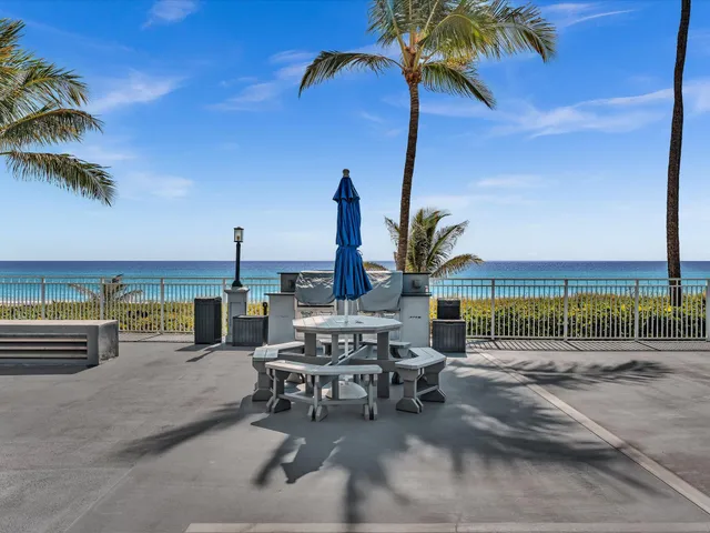 a view of a terrace with furniture