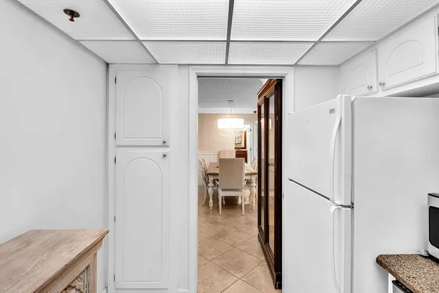a bathroom with a sink vanity and mirror
