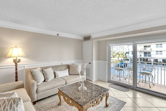 a bedroom with a bed and a lamp