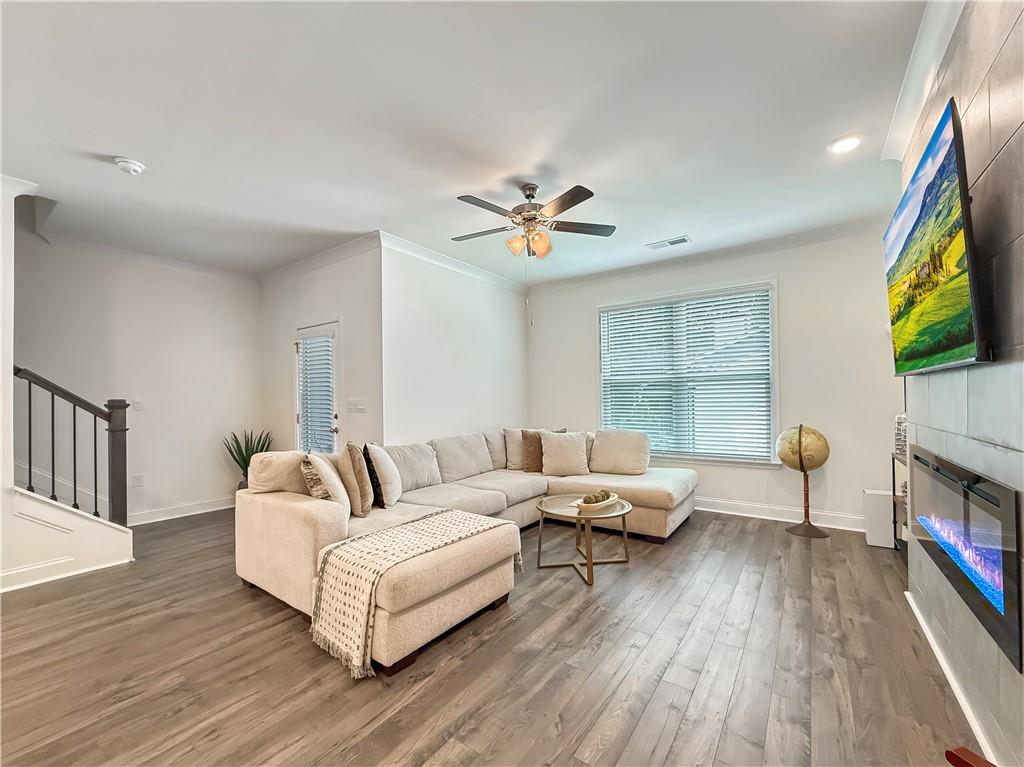 1160 Kendron Lane, Unit 16 Atlanta, GA 30329 - Photo 14 of 39 a living room with furniture and a flat screen tv