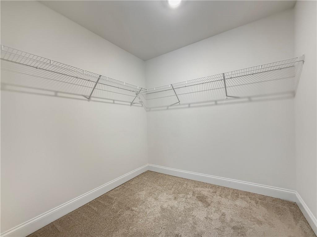 1160 Kendron Lane, Unit 16 Atlanta, GA 30329 - Photo 20 of 39 a view of a room with racks on the wall