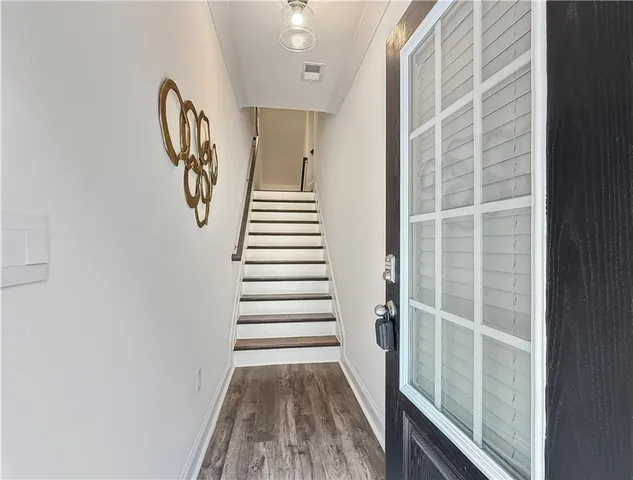 a view of entryway with a front door