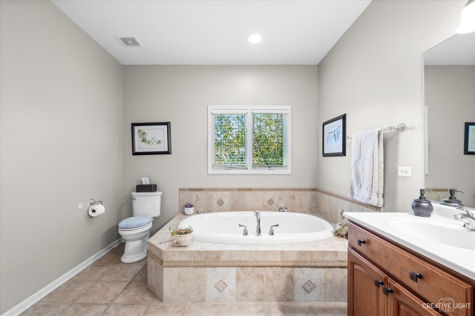 8N440 McGough Road Maple Park, IL 60151 - Photo 17 of 35 a white bath tub sitting next to a white toilet
