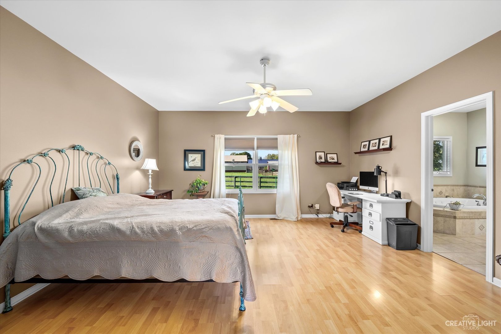 8N440 McGough Road Maple Park, IL 60151 - Photo 7 of 35 a spacious bedroom with a bed and a large window