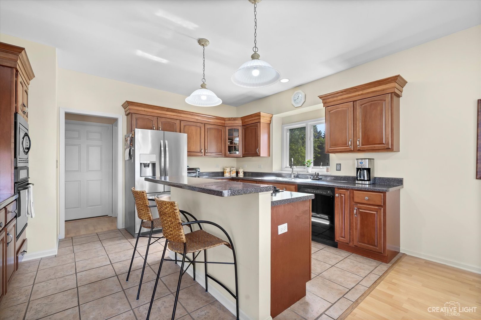 8N440 McGough Road Maple Park, IL 60151 - Photo 8 of 35 a large kitchen with a table and chairs