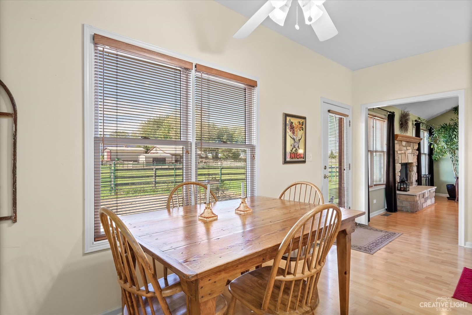 8N440 McGough Road Maple Park, IL 60151 - Photo 10 of 35 a view of a dining room with furniture window and wooden floor