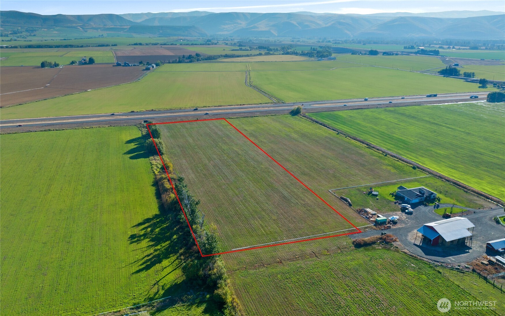 5-xx Rein Road Ellensburg, WA 98926 - Photo 15 of 20 a view of a lake with a yard