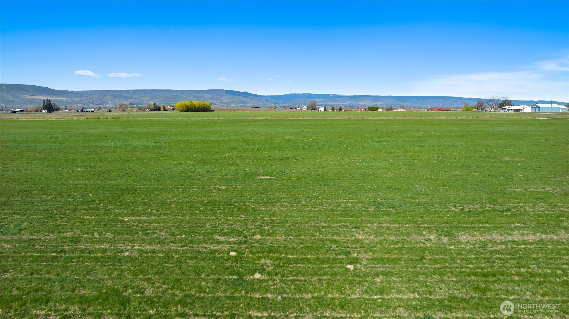 5-xx Rein Road Ellensburg, WA 98926 - Photo 2 of 20 a view of a field with an ocean view