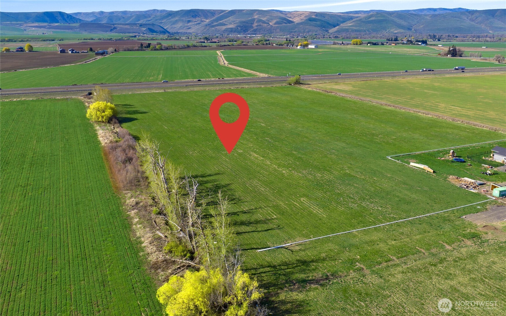5-xx Rein Road Ellensburg, WA 98926 - Photo 8 of 20 an aerial view of a golf course with a garden