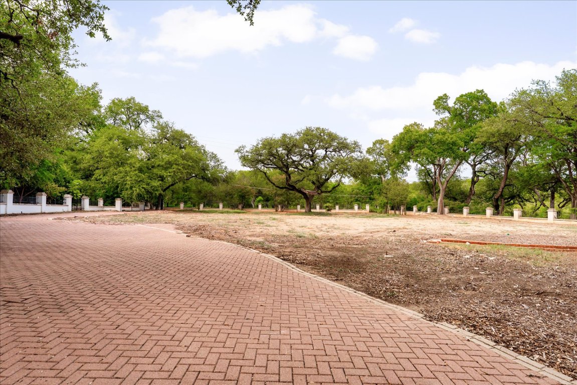 3917 Balcones Drive Austin, TX 78731 - Photo 4 of 9 a view of road with a yard