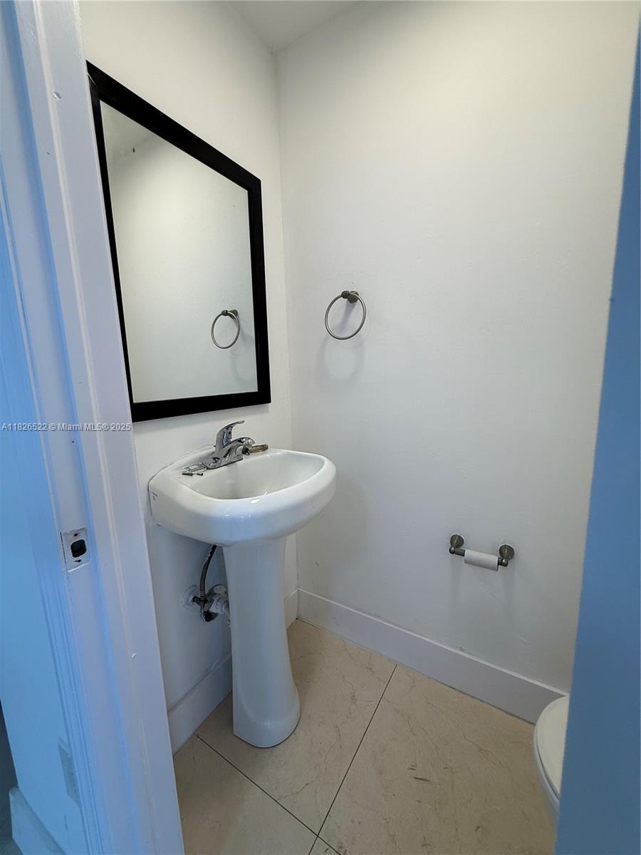 Flagami Miami, FL 33144 - Photo 17 of 20 a bathroom with a sink toilet