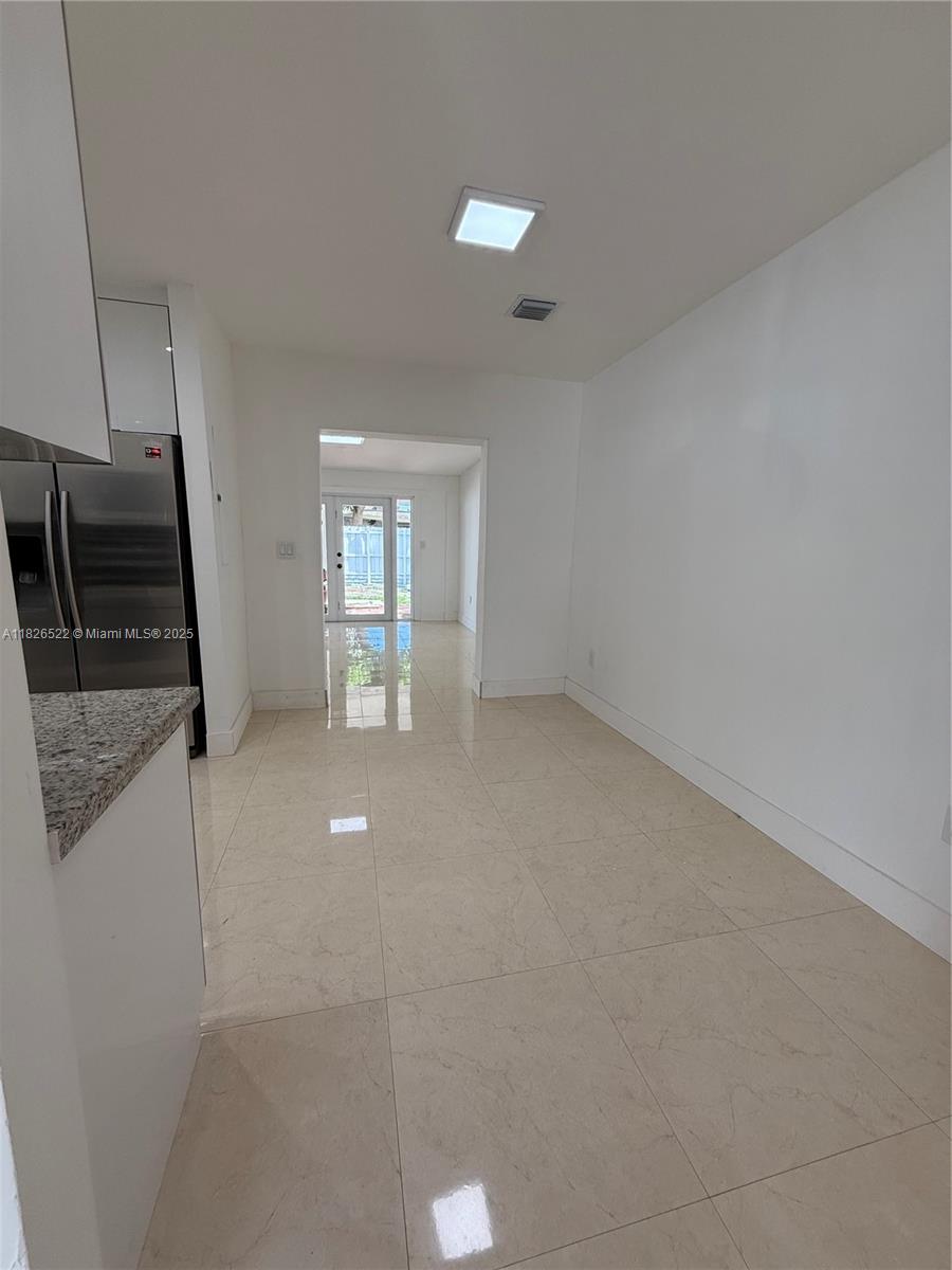 Flagami Miami, FL 33144 - Photo 3 of 20 a view of a livingroom with a fireplace