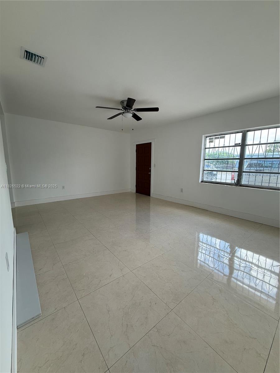 Flagami Miami, FL 33144 - Photo 5 of 20 a view of an empty room with a window
