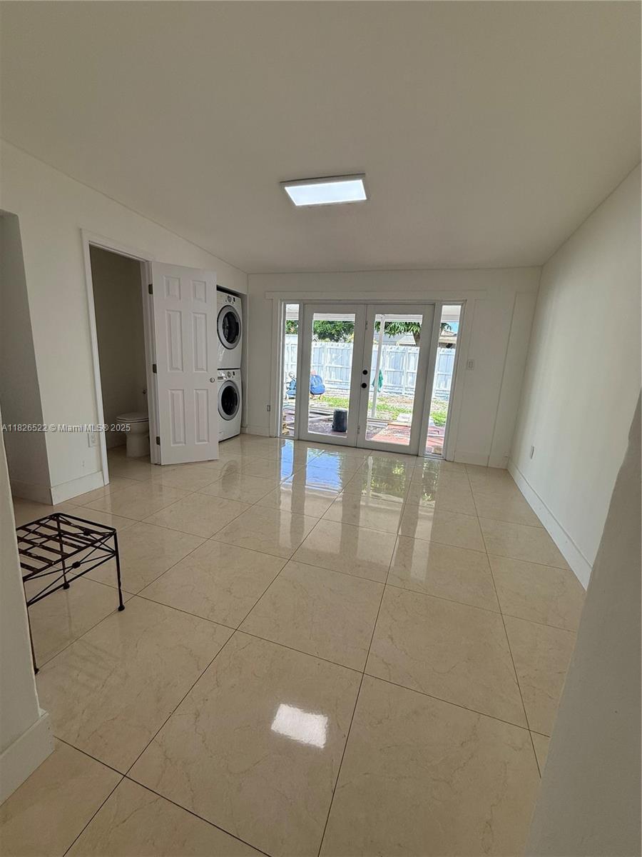 Flagami Miami, FL 33144 - Photo 7 of 20 wooden floor in an empty room with a window