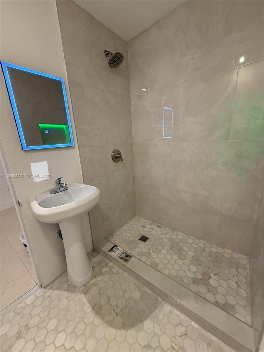 Flagami Miami, FL 33144 - Photo 9 of 20 a bathroom with a sink toilet and shower