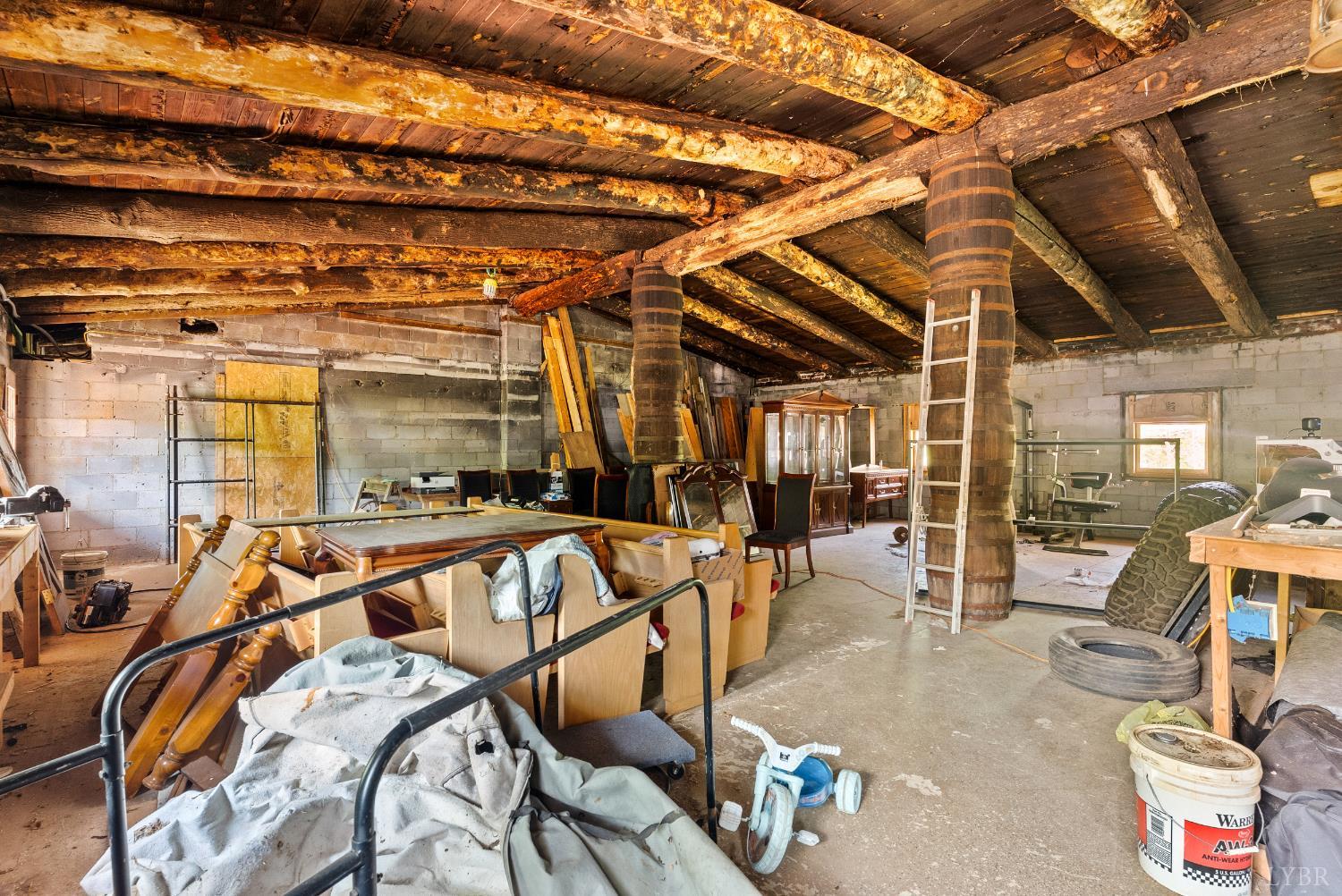 4067 Dickerson Mill Road Bedford, VA 24523 - Photo 19 of 90 a view of a room with gym equipment
