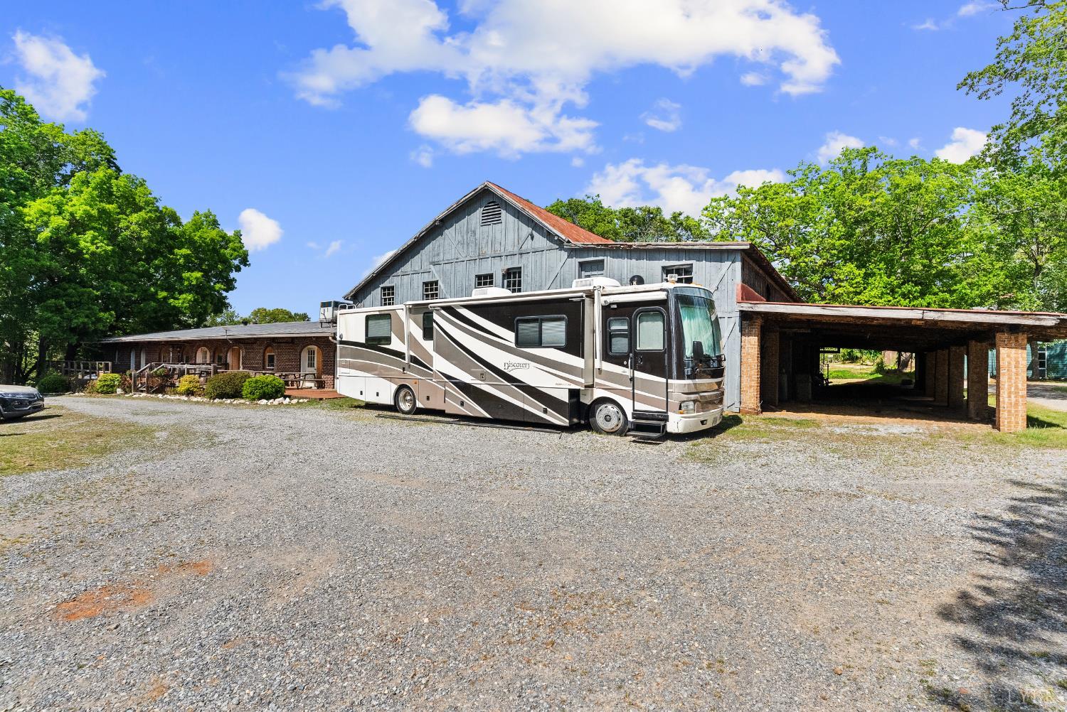 4067 Dickerson Mill Road Bedford, VA 24523 - Photo 39 of 90 a front view of a house with a yard and garage