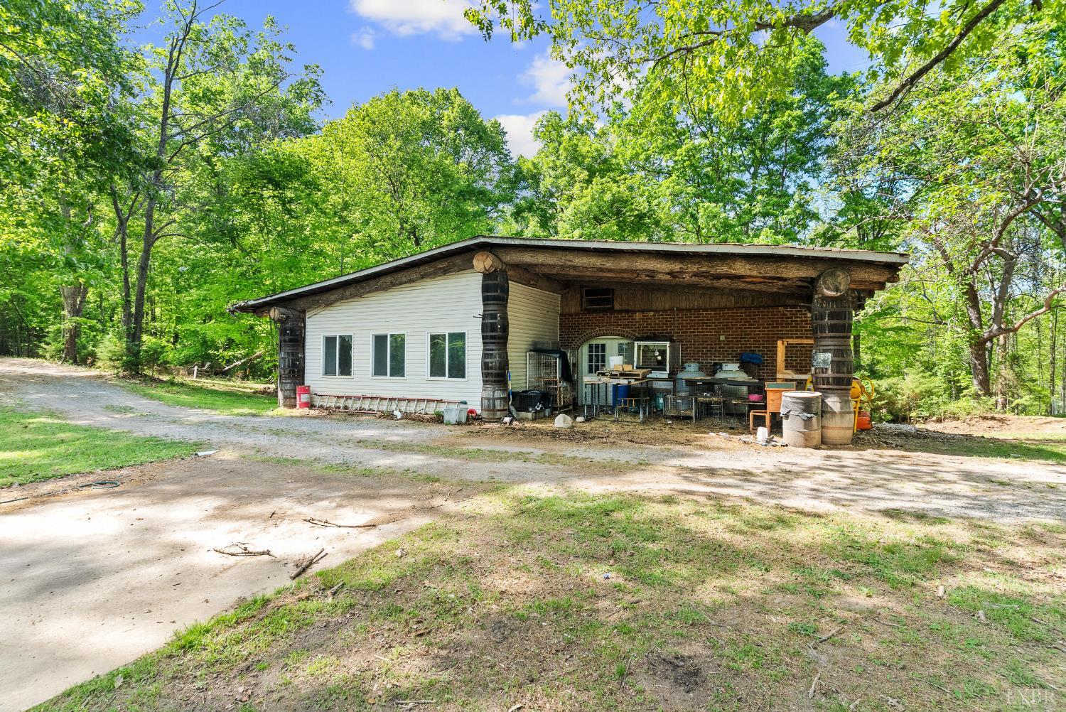 4067 Dickerson Mill Road Bedford, VA 24523 - Photo 43 of 90 a view of a house with backyard and sitting area