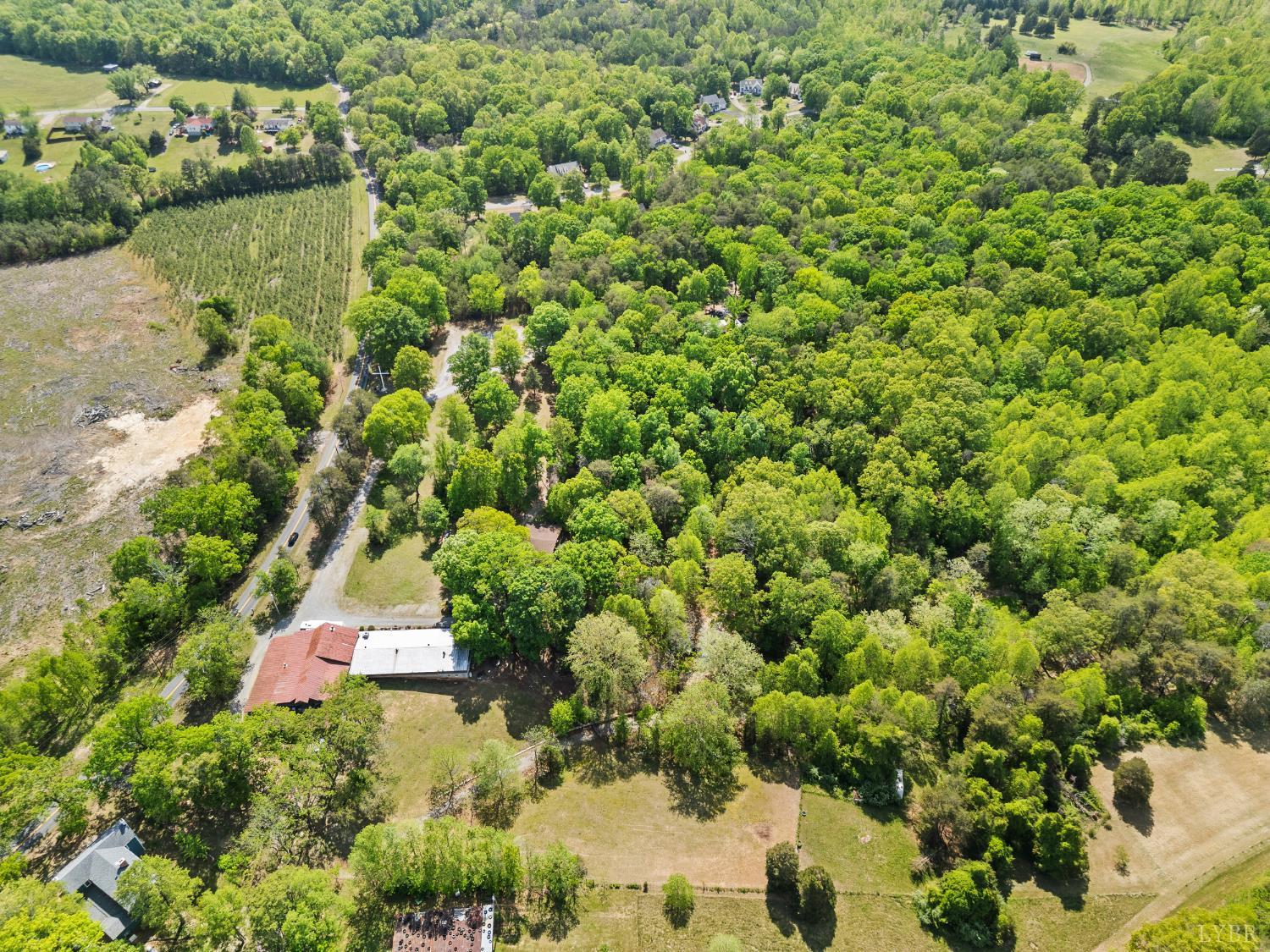 4067 Dickerson Mill Road Bedford, VA 24523 - Photo 83 of 90 an aerial view of residential house with outdoor space and trees around
