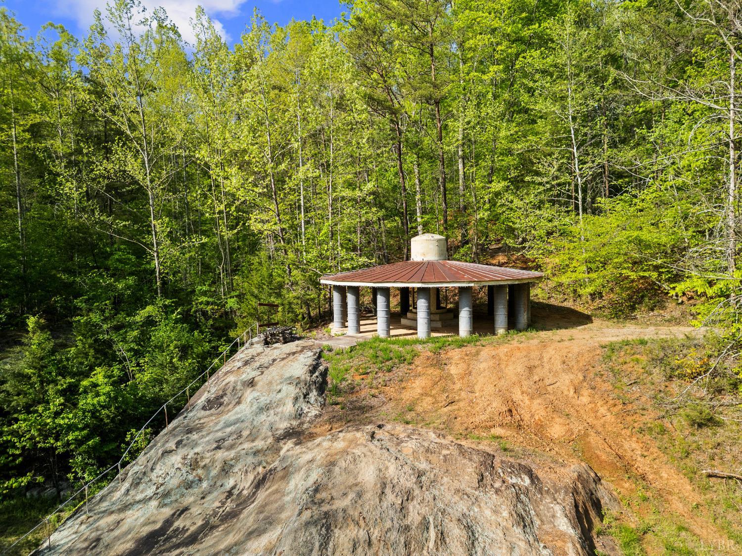 4067 Dickerson Mill Road Bedford, VA 24523 - Photo 86 of 90 a front view of a house with a yard