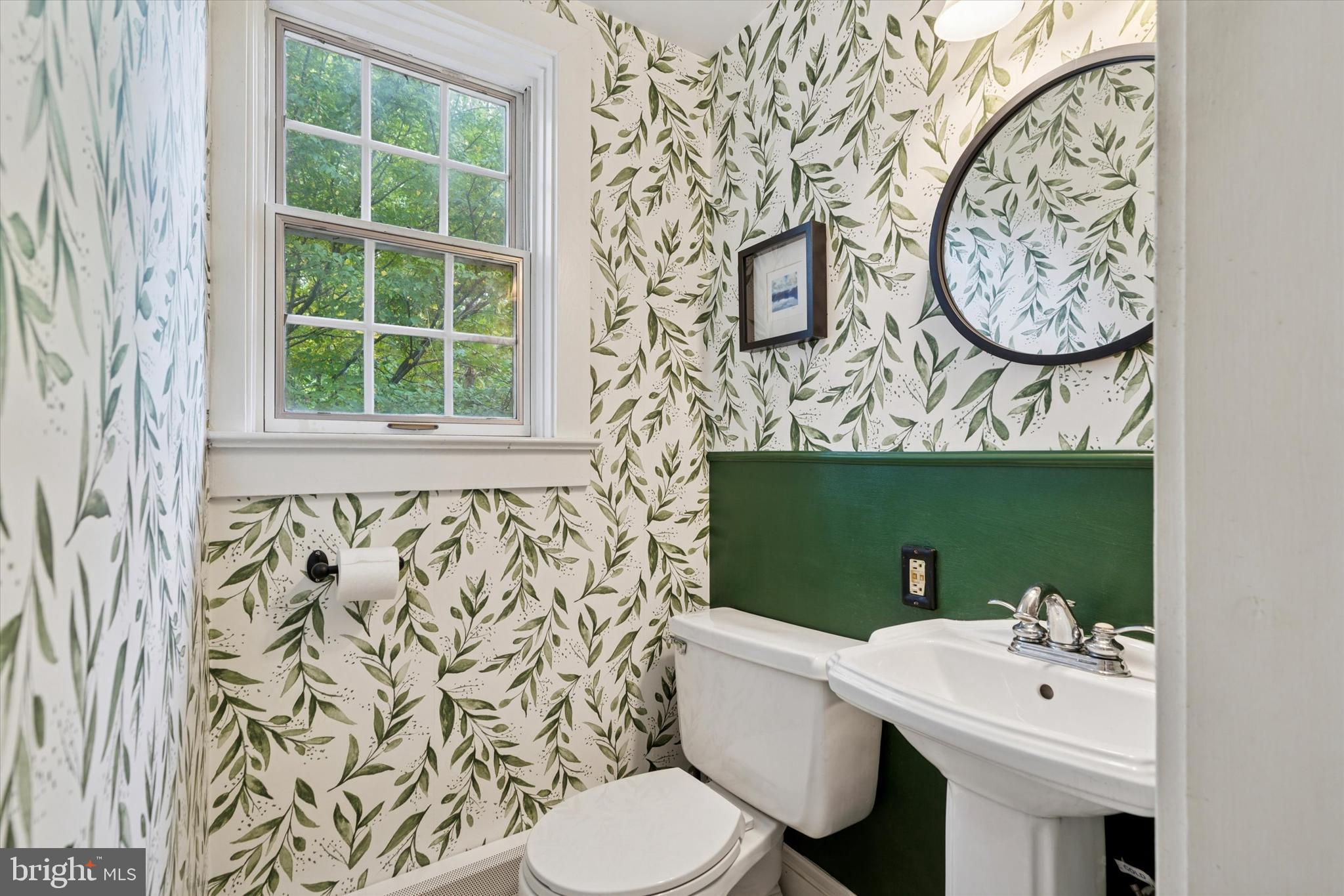 156 Idris Road Merion Station, PA 19066 - Photo 16 of 33 a bathroom with a sink and a mirror