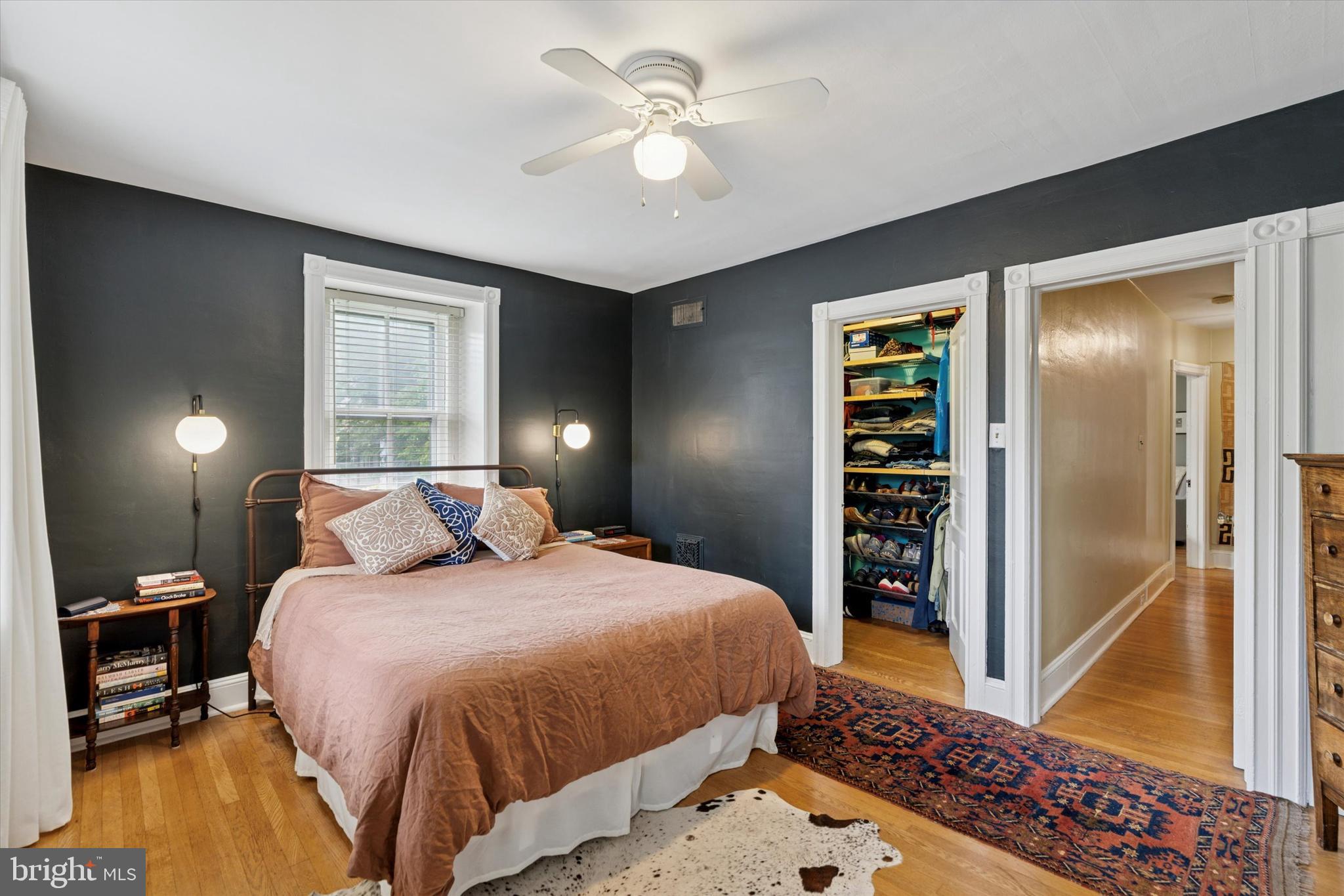 156 Idris Road Merion Station, PA 19066 - Photo 21 of 33 a bedroom with a bed and a chandelier