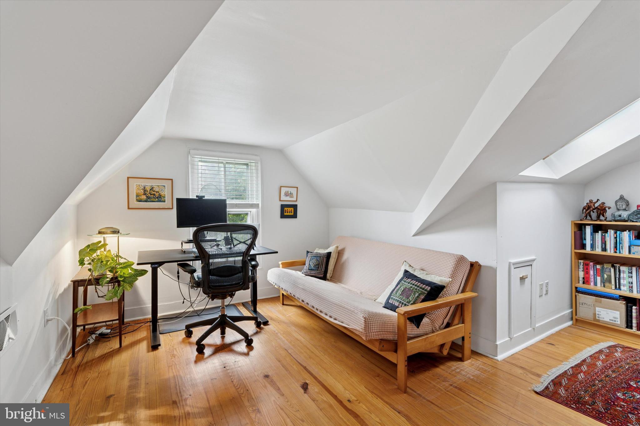 156 Idris Road Merion Station, PA 19066 - Photo 28 of 33 a living room with furniture and a book shelf
