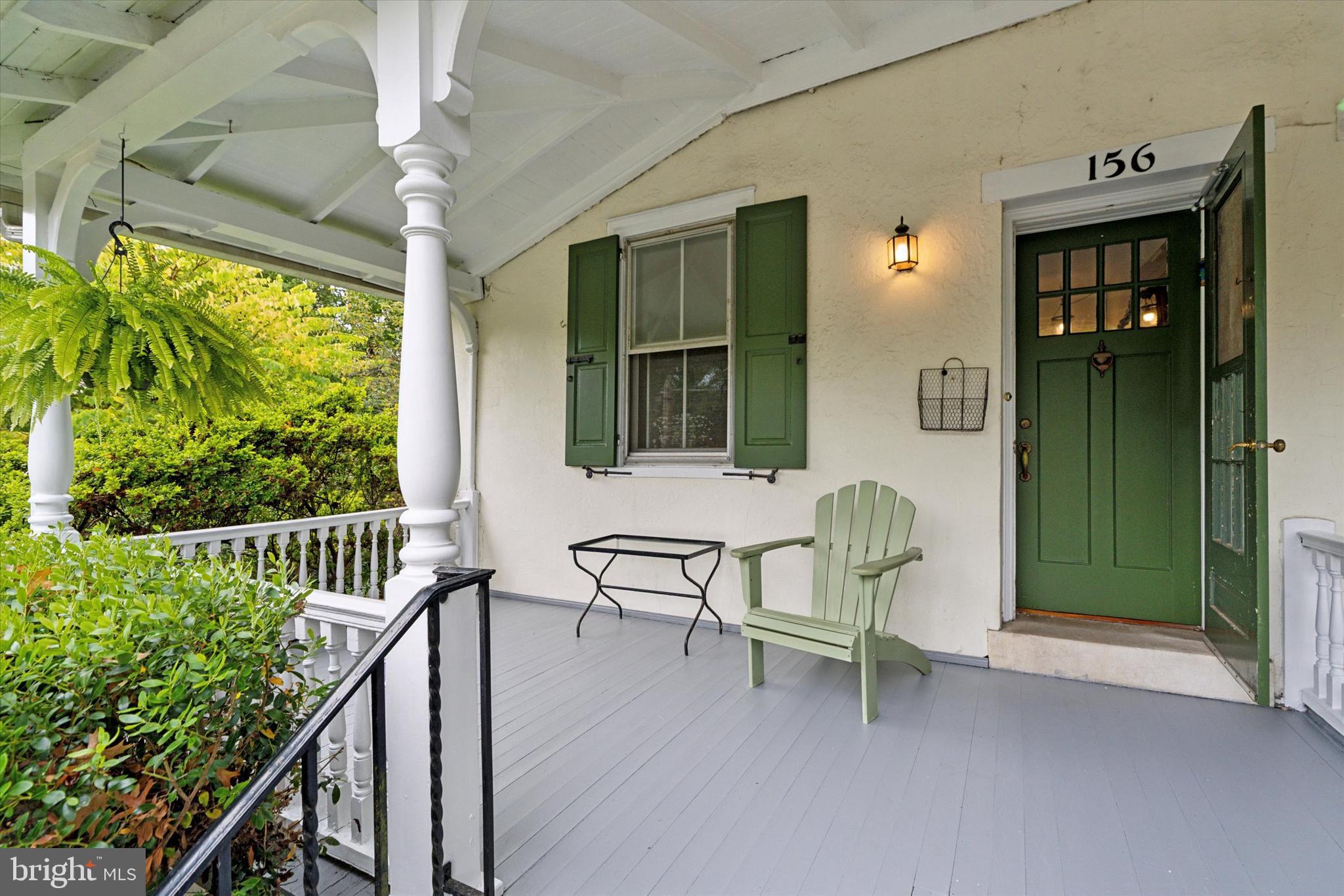 156 Idris Road Merion Station, PA 19066 - Photo 4 of 33 a view of a porch with chairs and backyard