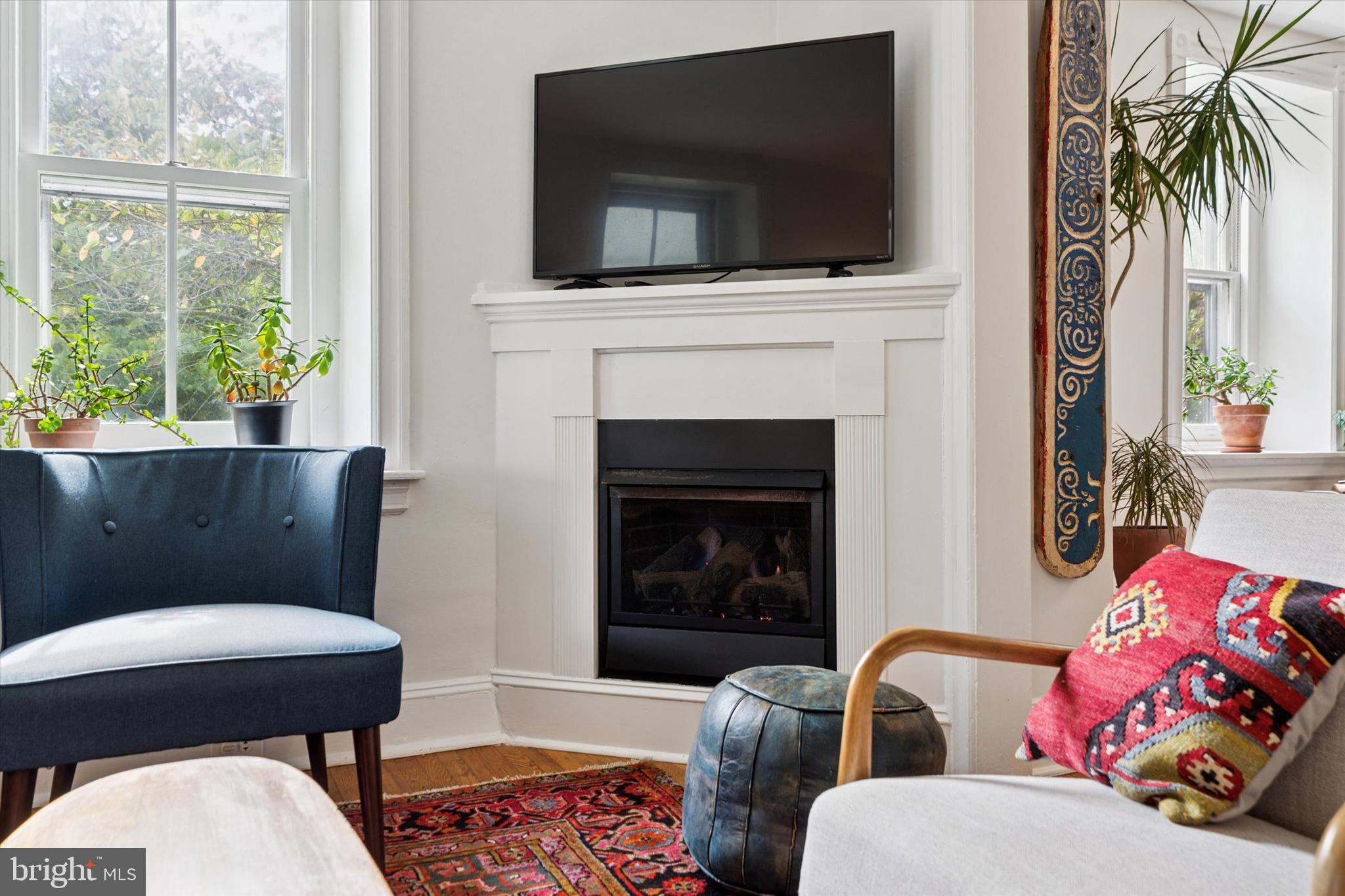 156 Idris Road Merion Station, PA 19066 - Photo 8 of 33 a living room with furniture fireplace and flat screen tv