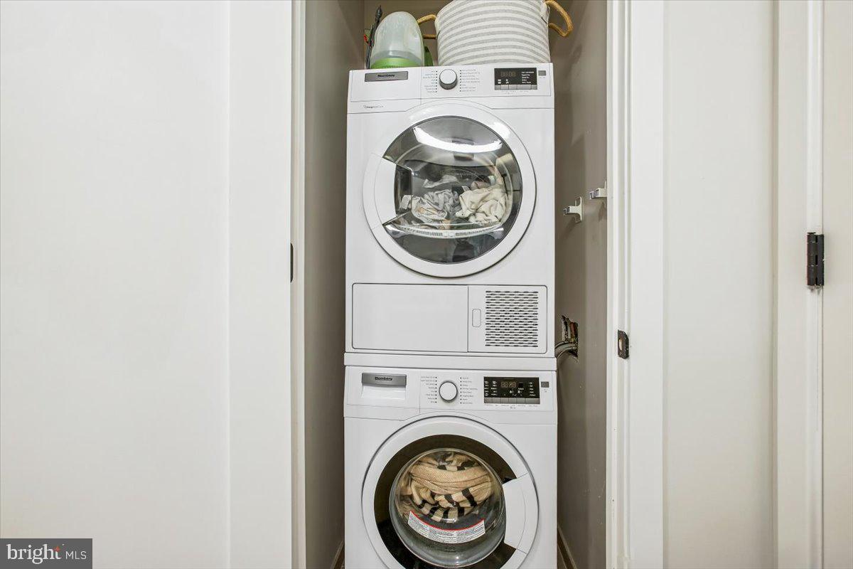 1211 Van Street Southeast, Unit 902 Washington, DC 20003 - Photo 12 of 43 a utility room with dryer and washer