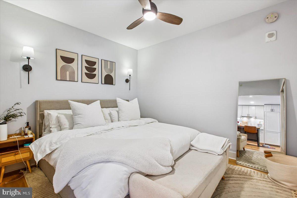 1211 Van Street Southeast, Unit 902 Washington, DC 20003 - Photo 17 of 43 a large white bed in a white room