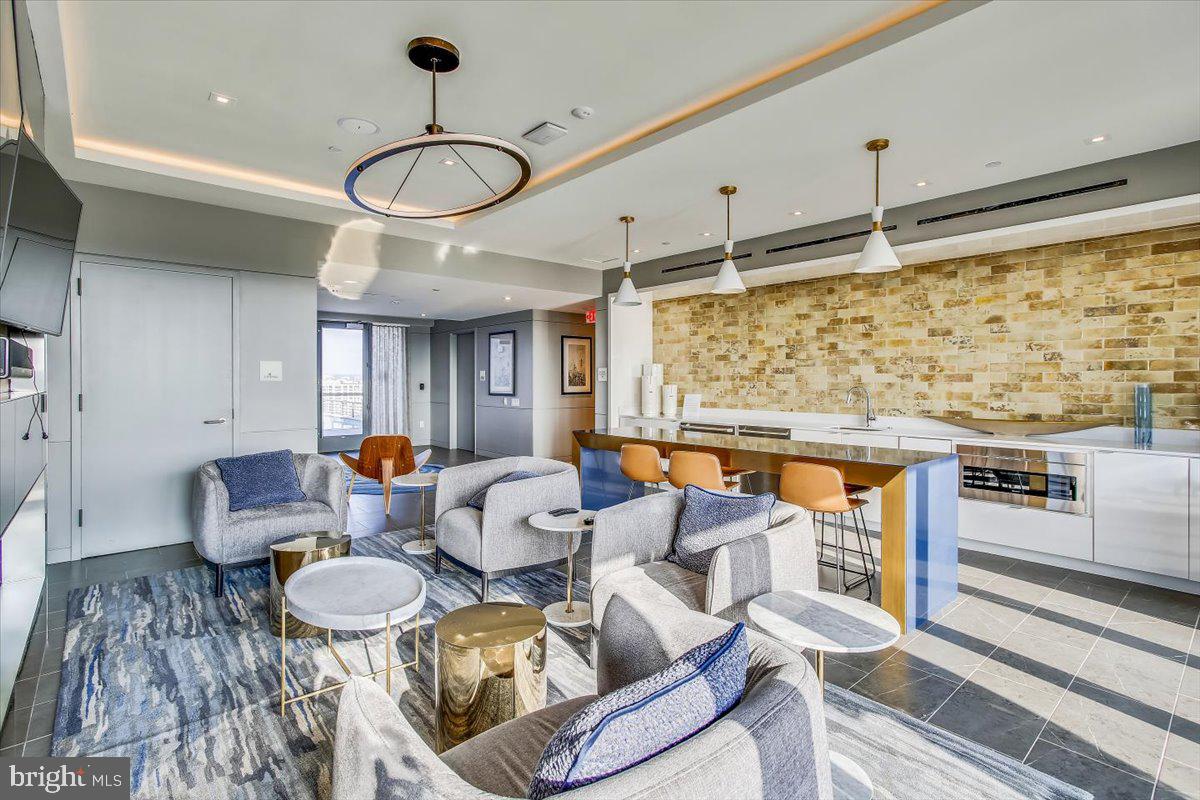 1211 Van Street Southeast, Unit 902 Washington, DC 20003 - Photo 35 of 43 a very nice looking dining room with a table and chairs