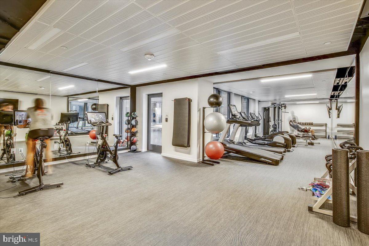 1211 Van Street Southeast, Unit 902 Washington, DC 20003 - Photo 39 of 43 a view of a room with gym equipment