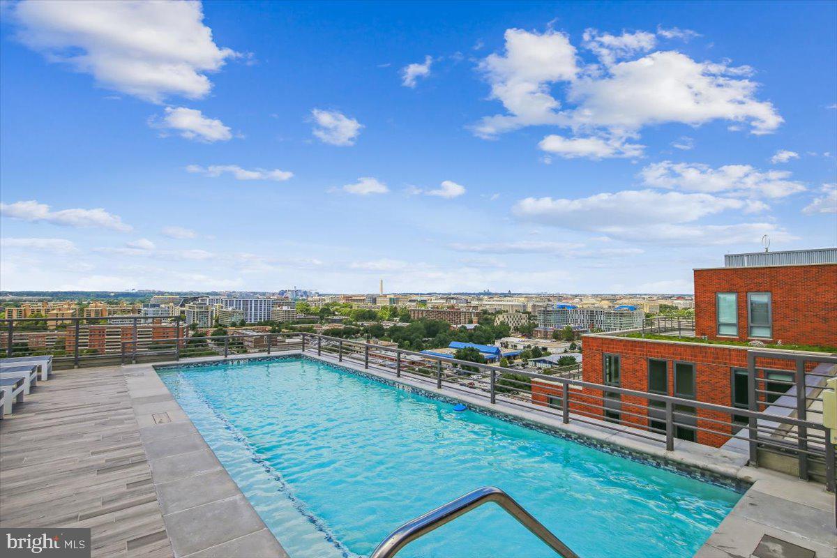 1211 Van Street Southeast, Unit 902 Washington, DC 20003 - Photo 41 of 43 a view of a swimming pool with a terrace