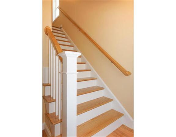 23 Mott Street, Unit 1 Arlington, MA 02474 - Photo 17 of 28 a view of a hallway with staircase