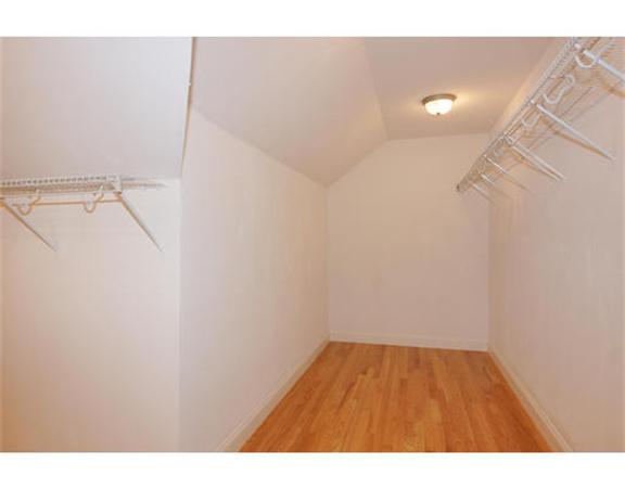 23 Mott Street, Unit 1 Arlington, MA 02474 - Photo 25 of 28 a view of small space with racks on the wall