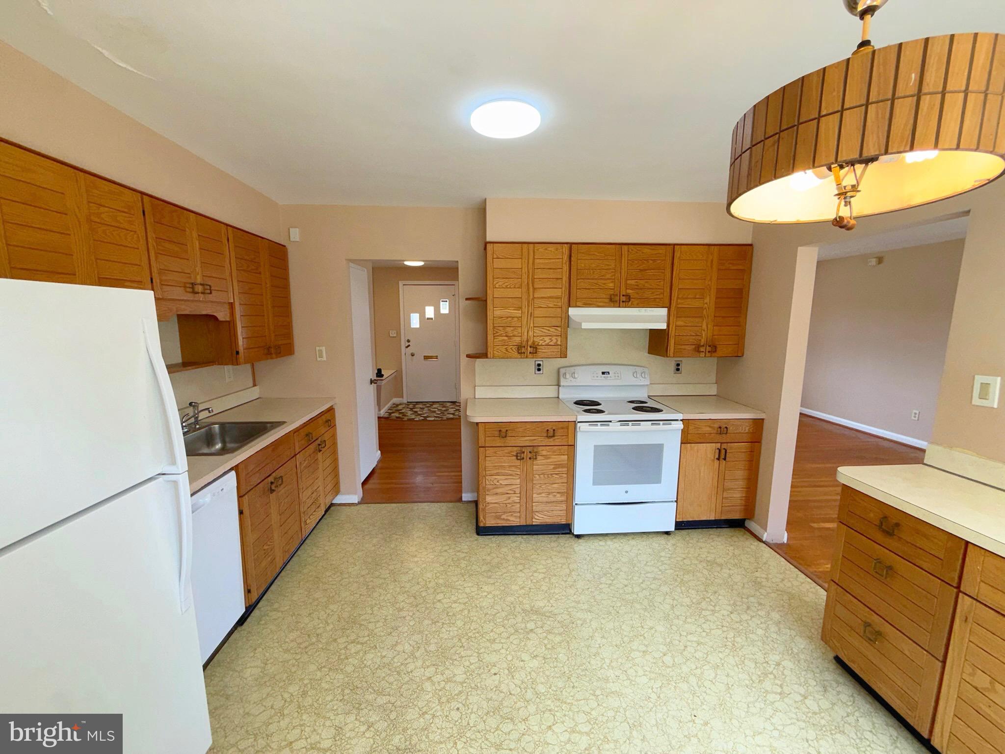 7104 Adelphi Road Hyattsville, MD 20782 - Photo 8 of 35 Kitchen 2/3