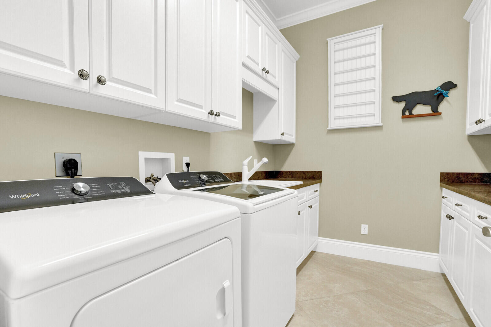 1610 Southwest Dyer Point Road Palm City, FL 34990 - Photo 24 of 35 Full-Size Laundry Room