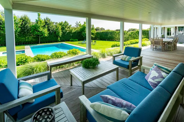 a view of a patio with swimming pool
